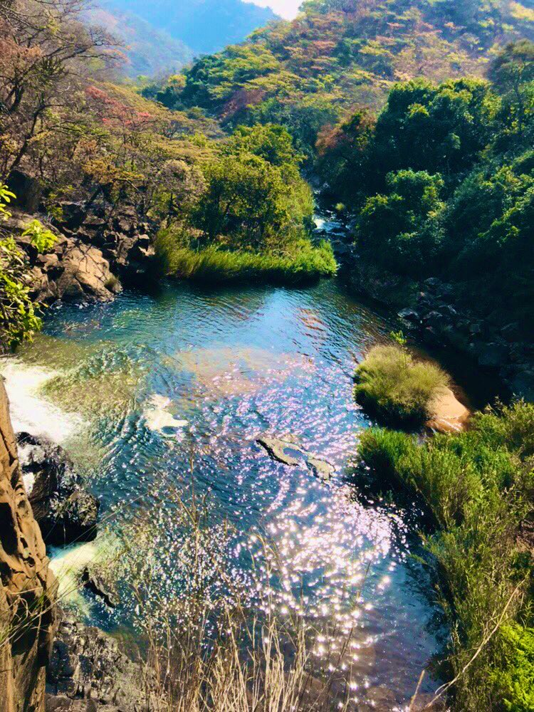 Nyangombe FallsFlowing on the Nyangombe River, are the stunningly beautiful falls, which give a scenic view from the top as water cascades down the river. Beautiful rockery & a lovely serenity pool at the bottom. Expect some light sprays from the falls water too! Perfect spot!