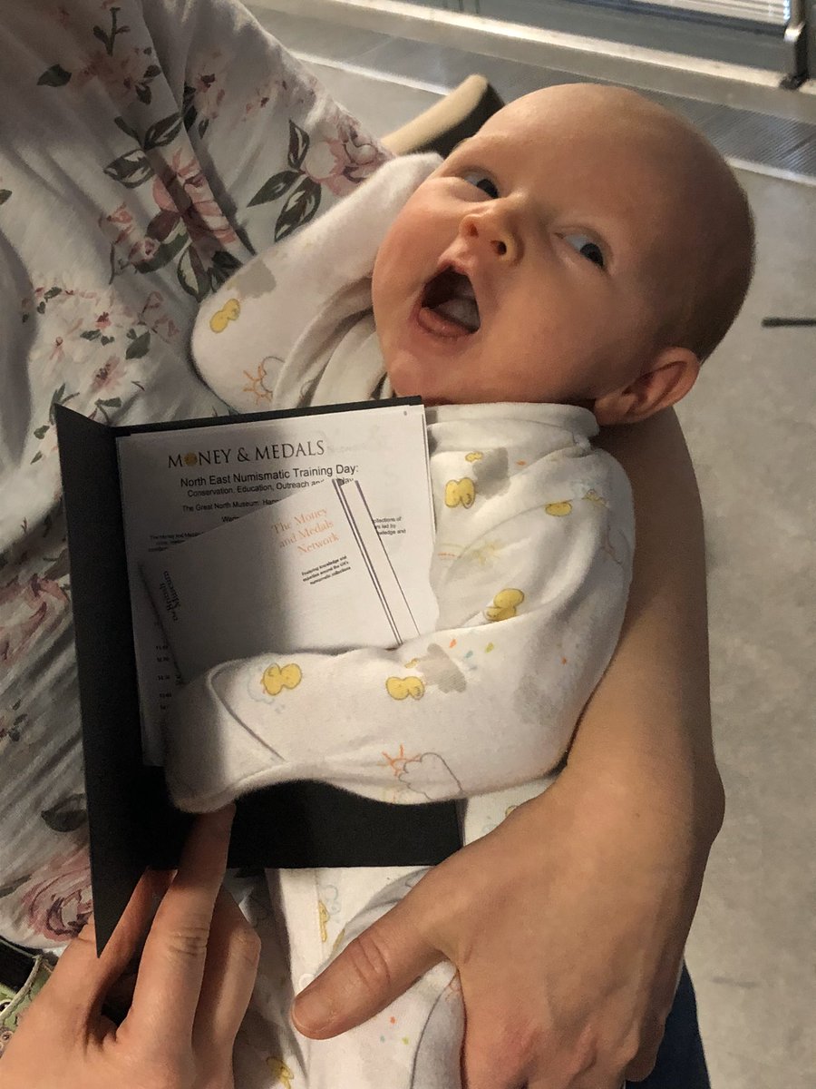 ...who could forget Nieve, daughter of  @wallcurator and our youngest and most well-behaved attendee at a  #MoneyandMedals training day ever?!? Here she is with her baby-sized delegate pack!