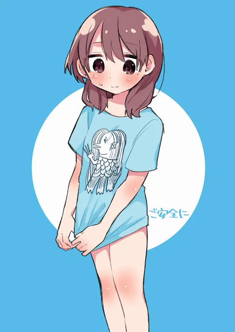 生徒達から送られてきたシャツを着る押谷 