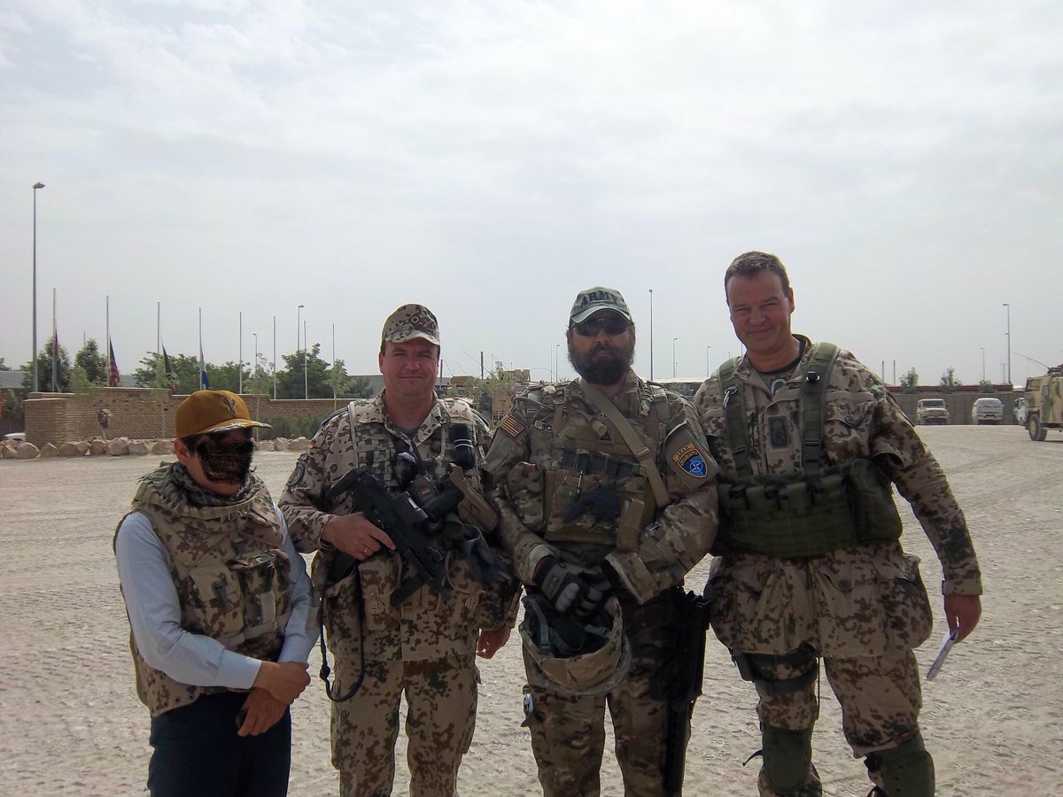 MaturingScott's tweet image. Embedded Counterinsurgency advisor with the Bundeswehr in Kunduz, AFG. I’m the 6’4 beard. The guy to my left is 6’8”.  I carried a #hecklerandkoch G36 rifle and USP sidearm. Every German company had a bar and foosball tables lol! #miltwitter #masculinity #warrior #fuckthetaliban