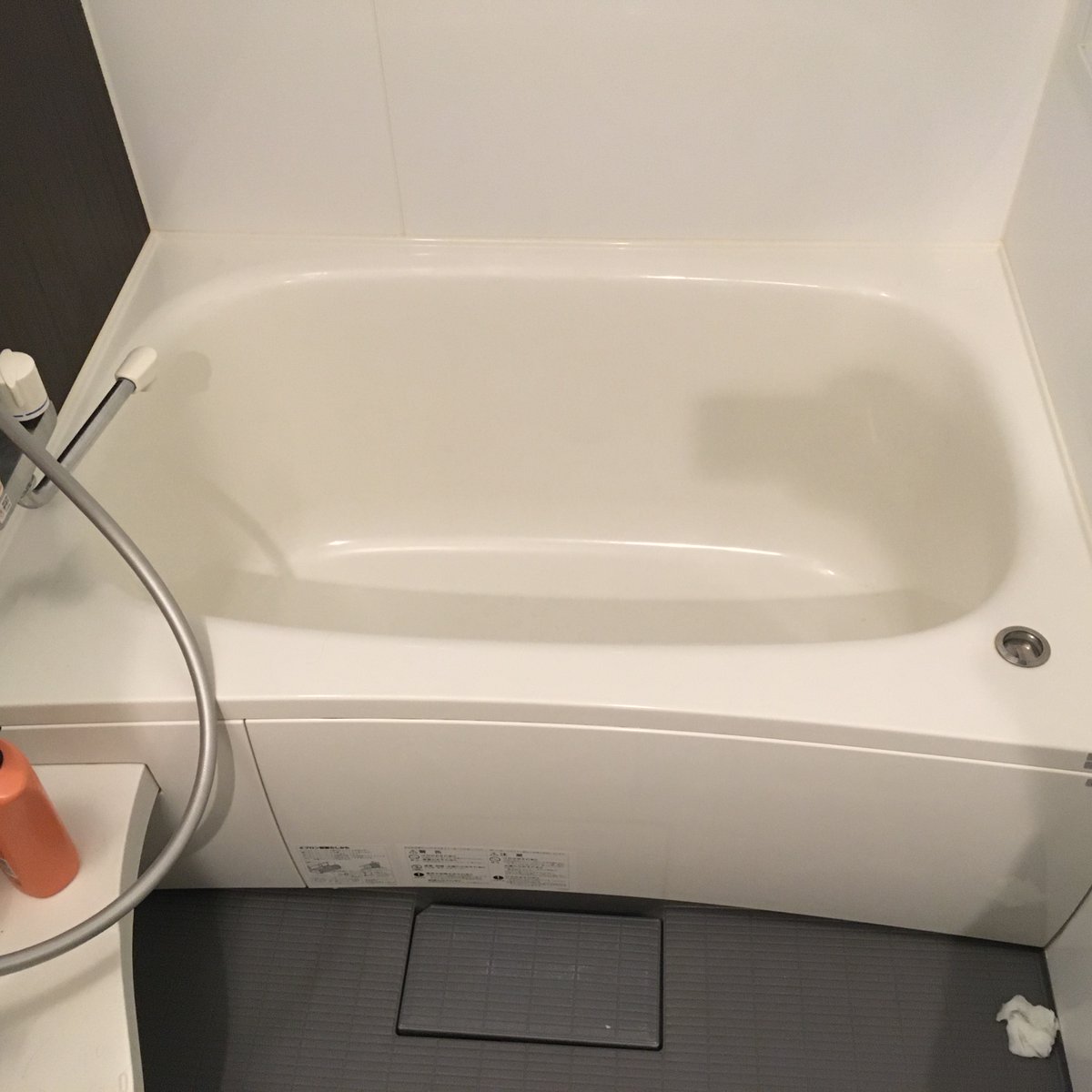 Dear bathtub Twitter: this is my tub in Japan. It is very deep and you can fill it to the top. If it overflows, the floor drain catches it. Why does every American tub have a killjoy drain 3/4 of the way up, so you can never properly immerse yourself? Is there some law in play?