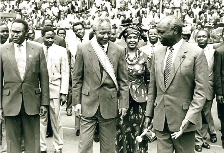 Firstly, Nelson Mandela was a free man, having been released in February of 1990. Indeed, a few months later, in July, Mandela accompanied by his wife Winnie Mandela, toured Kenya as part of a continent-wide “thank you” tour.