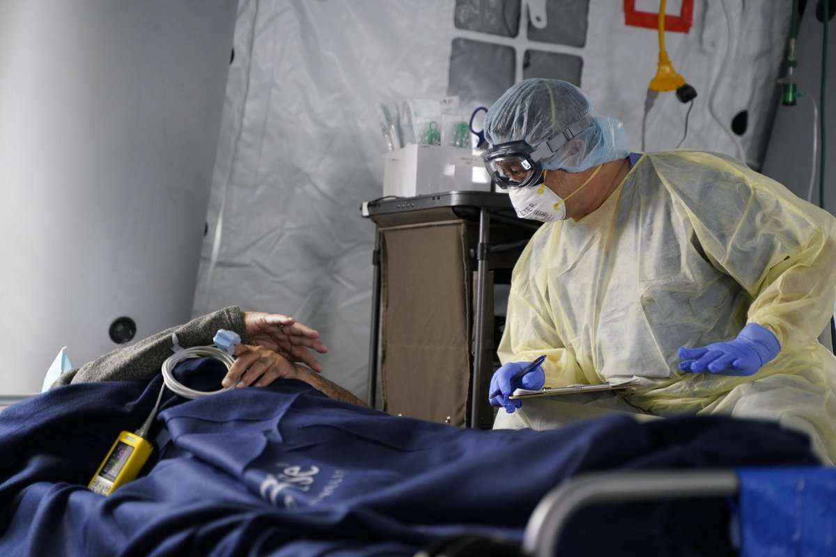 SamaritansPurse's tweet photo. At our Emergency Field Hospital, we are able to care for critically ill patients with the #coronavirus. Yesterday, the doors to our hospital opened to the first patient. https://t.co/QaKoJdKhlz https://t.co/wTlqkQu8tw