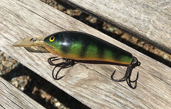 BassFanNews's tweet photo. Old lures often carry a lot of meaning with them. For BassFan senior editor John Johnson, a vintage #Rapala #FatRap that he received as a gift from a work colleague will likely never see the water again, largely because of the story behind it. Read more: https://t.co/gULqThg5k4 https://t.co/ydELydV8td