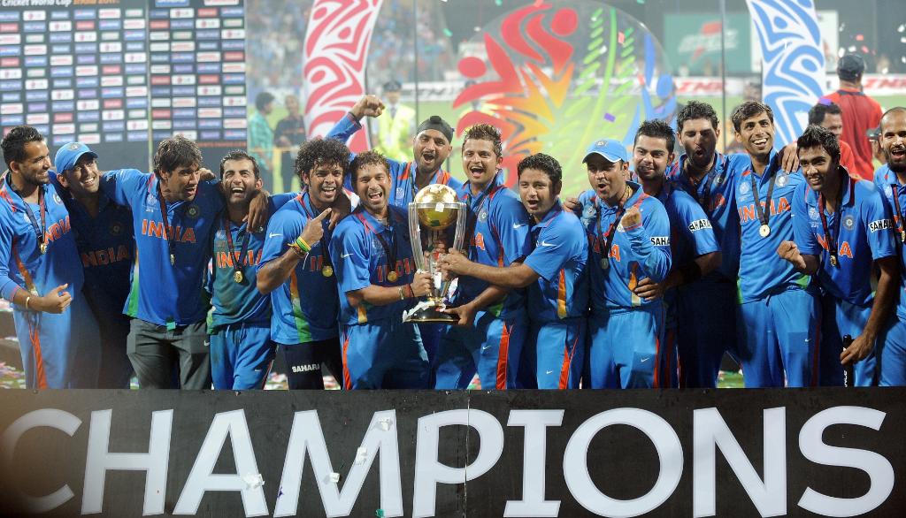 ICC's tweet photo. 🏆 CHAMPIONS 🏆 

A fantastic 91* from MS Dhoni, as well as Gautam Gambhir's crucial 97, saw India home with six wickets to spare in the final of the 2011 @cricketworldcup! 🎉 https://t.co/HS2fXC1soV