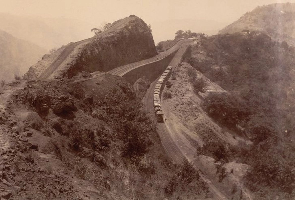 The present day 'Amrutanjan Bridge' was part of this reversing station alignment (see old photo below). The steam engine had to be flipped 180 deg on a reversing turn-table and then attached to the opp. end of the train. This added significant time to the journey.