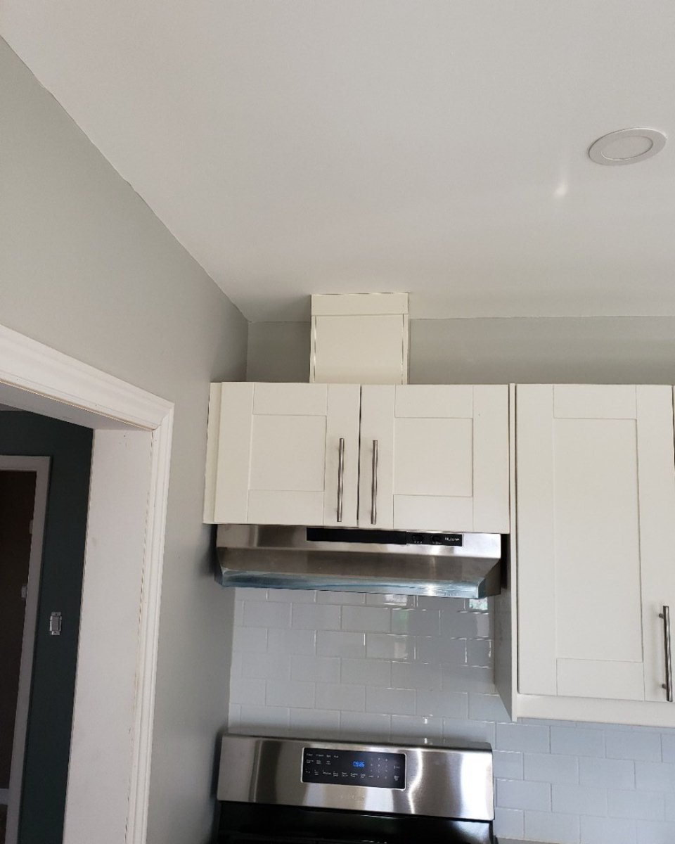 ContractingJack's tweet photo. The guys got creative over at another reno in Hamilton. The hood fan vent was exposed because of a gap between the cabinets and the ceiling , so they made this cover which when painted will blend it al together.

#renovation #Hamilton #Ontario #GeneralContractor https://t.co/T52OnnojVr
