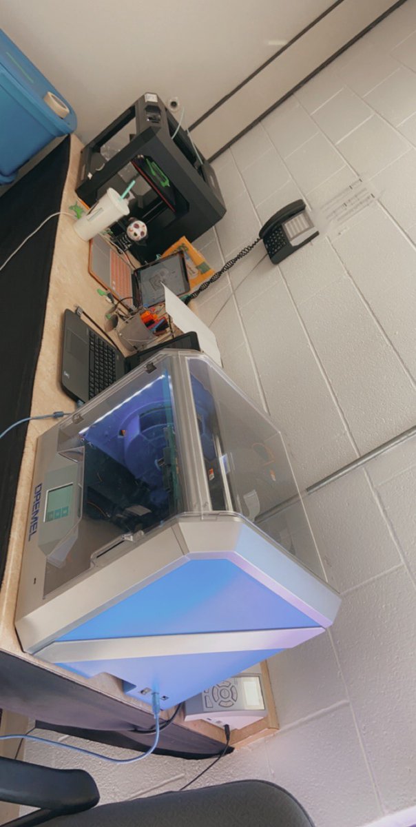CavernaSTLP's tweet photo. We still managed to practice social distancing while figuring out how to make shields with our classroom 3D printers. Switching to our Caverna purple tomorrow and donating all of these to our local hospital! #TeamCaverna #TeamKentucky #TogetherKy https://t.co/MwLfx6DXZr