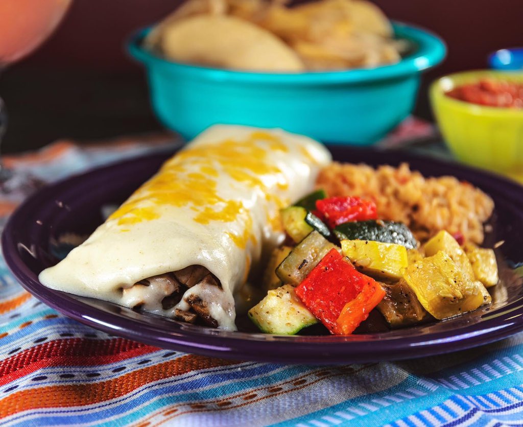 #NationalBurritoDay but make it to-go 🎉 Bring the fiesta home for dinner tonight with curbside pickup or delivery. Call in • order online • or get it delivered with Postmates or DoorDash!