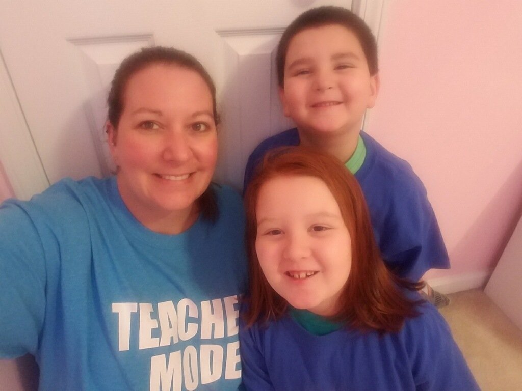 JennyCone5's tweet photo. Mrs. Jen and family show off their blue for Autism Awareness! @WakelonES https://t.co/PbQYEmKLPd