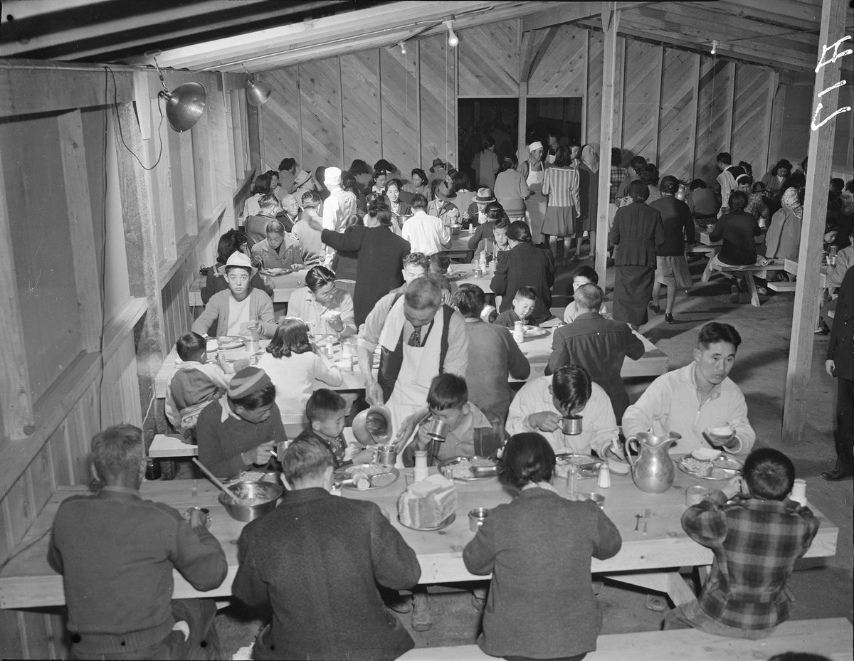JGuybee's tweet photo. Dining Hall scene at the Manzanar Relocation Center for deported Japanese-Americans, Inyo County, California, United States, 2 Apr 1942. https://t.co/MnxWdZmN0v