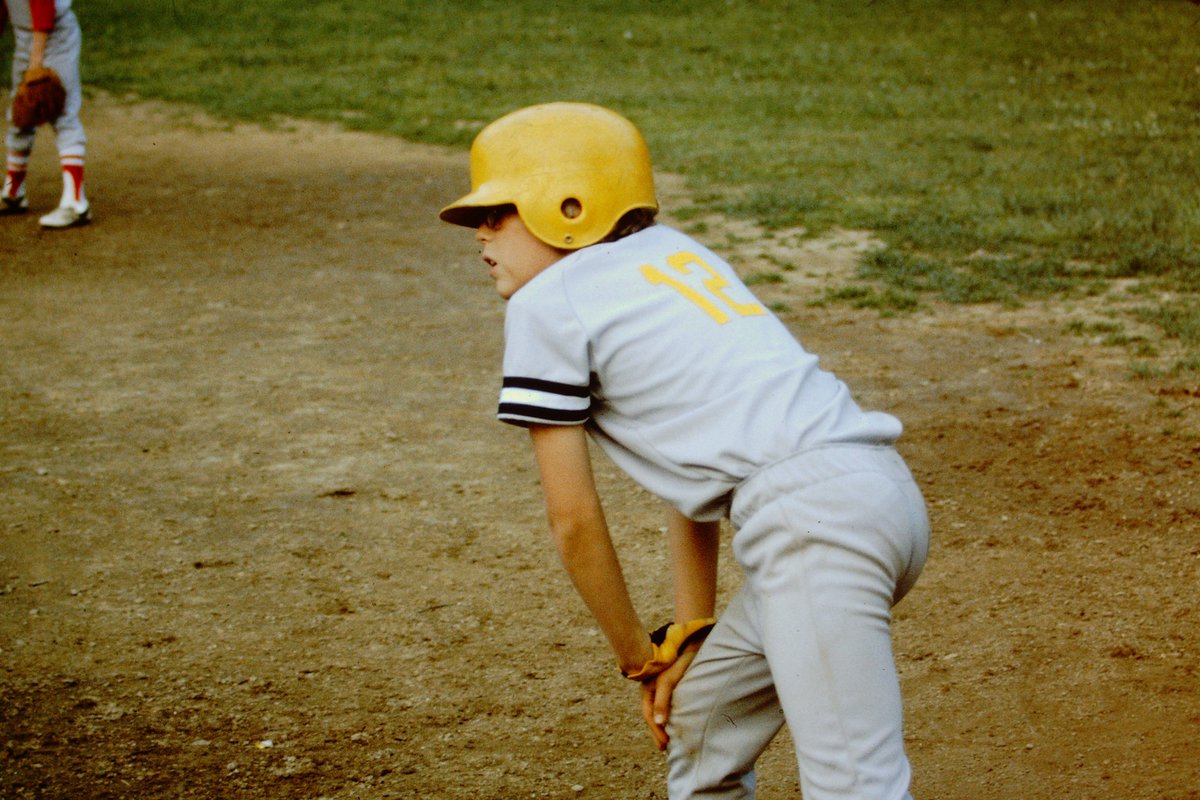 Here was a good older brother...Showed support of his younger brother playing sports, BUT still trash talked him in the captions on the slides. The one of him batting says "He's No Hitter"