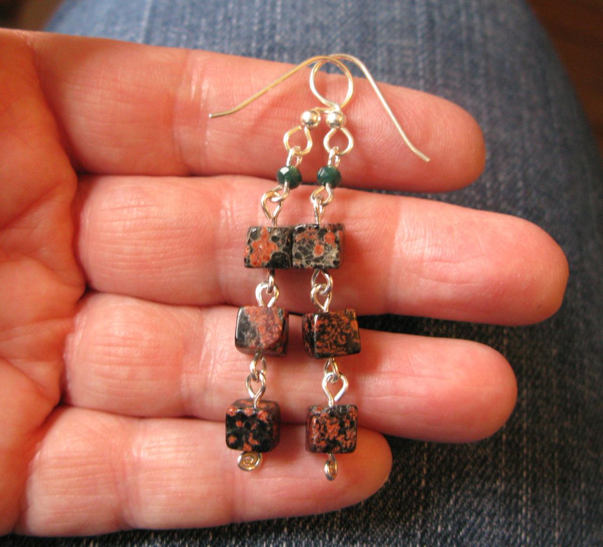 The matching earrings were called "Three Dragon Stories." They featured little cubes of the Mexican red snowflake jasper like the ones in "How Dragons Got Here."