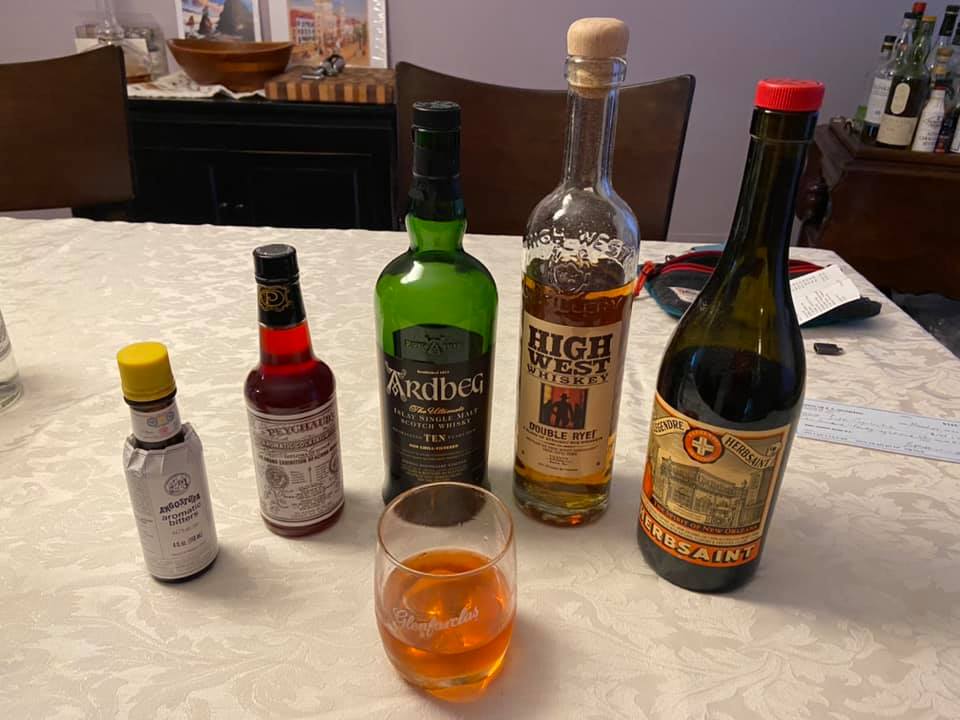 The Gaelic Quarter (Sazerac riff)2 oz High West double rye0.5 oz Ardbeg 10 year single malt scotch0.25 oz Herbsaint (rinse)1 sugar cube (few drops water)2 dashes Peychaud’s bitters2 dashes Angostura bittersLemon peel