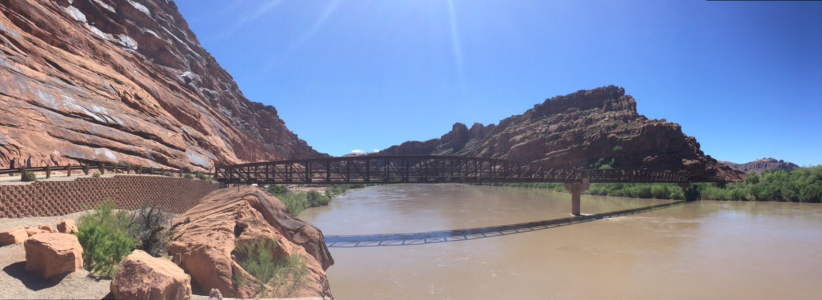 The Moab Bridge on the outskirts of Arches National Park, Utah. The Colorado River flowing downstream to the Grand Canyon.