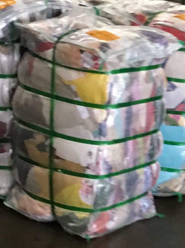 Everything is based on pounds and cents. A container will weigh upwards for 42,000lbs when full. Processors overseas take these baled clothes and separate them into different categories. Shirts, pants, blouses ect. Then those items are placed into 100lb bales. Look like this