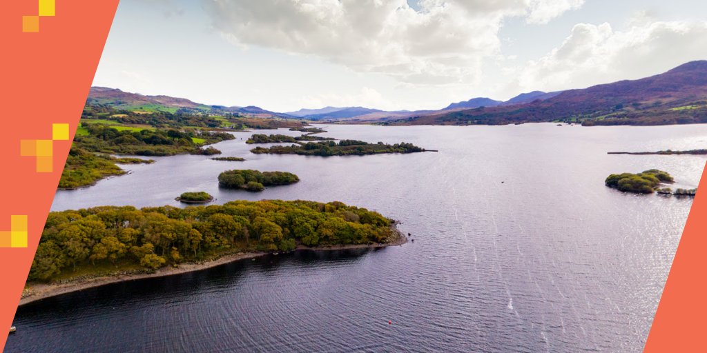 Panoramic view of expansive lake/valley.