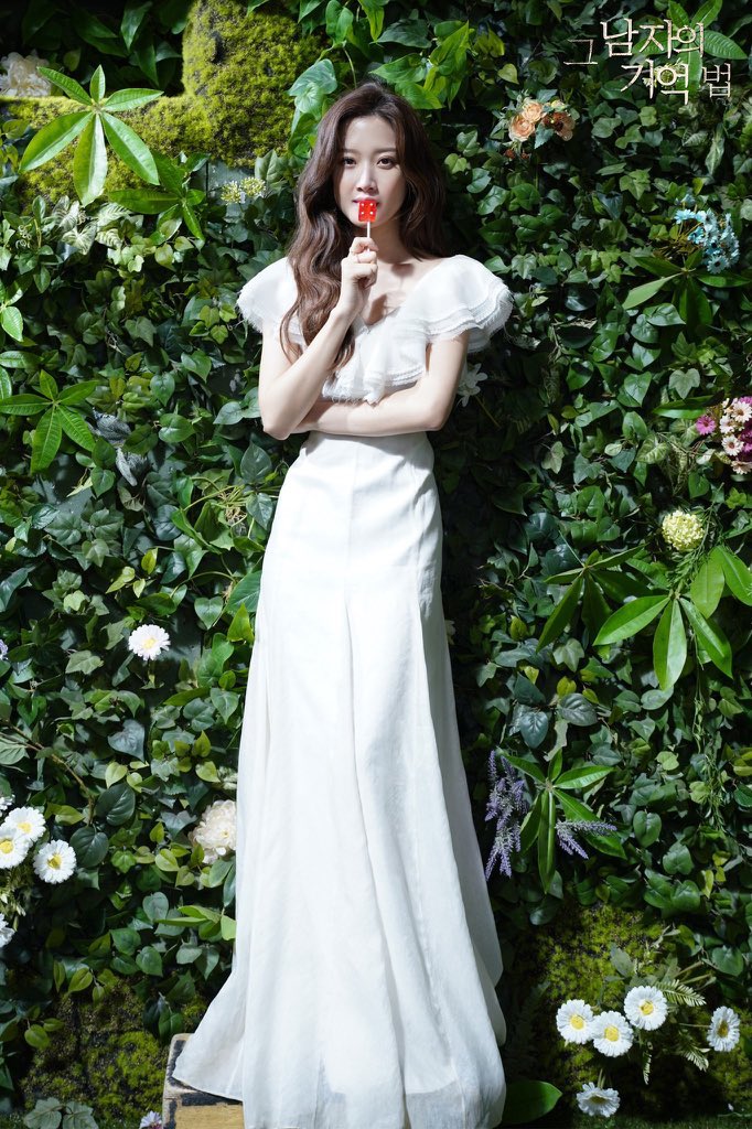 white & red long dress. she’s stunning