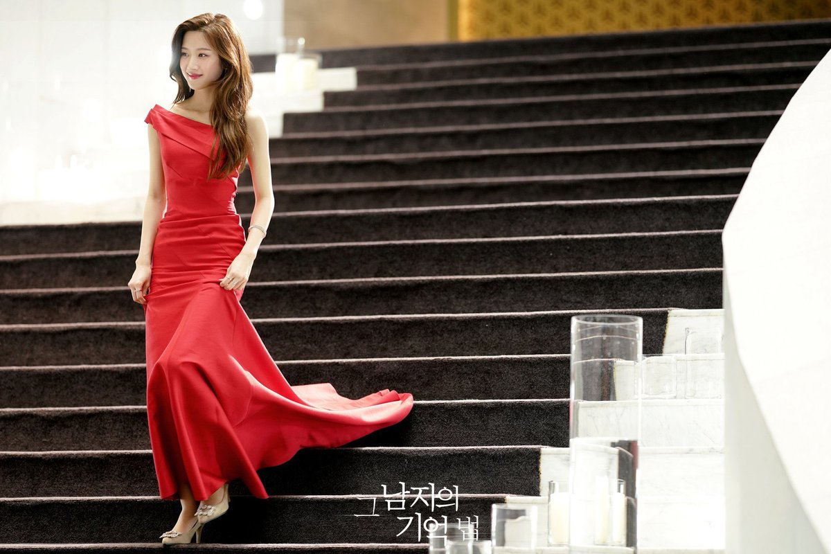 white & red long dress. she’s stunning