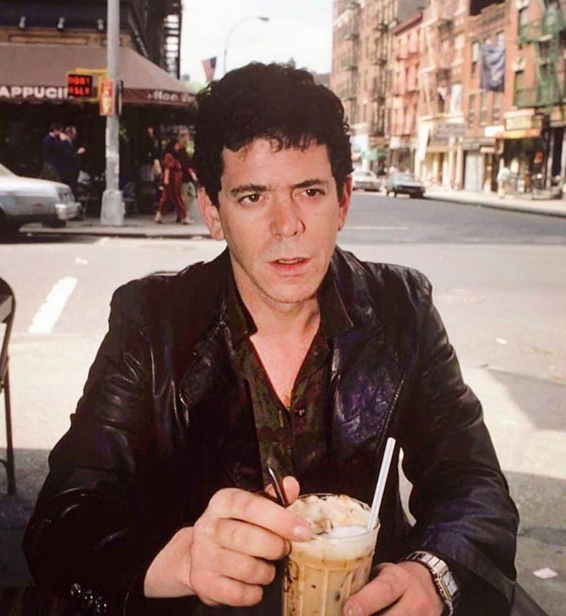 Lou Reed (Velvet Underground) enjoying an egg cream float outside a cafe - 1971