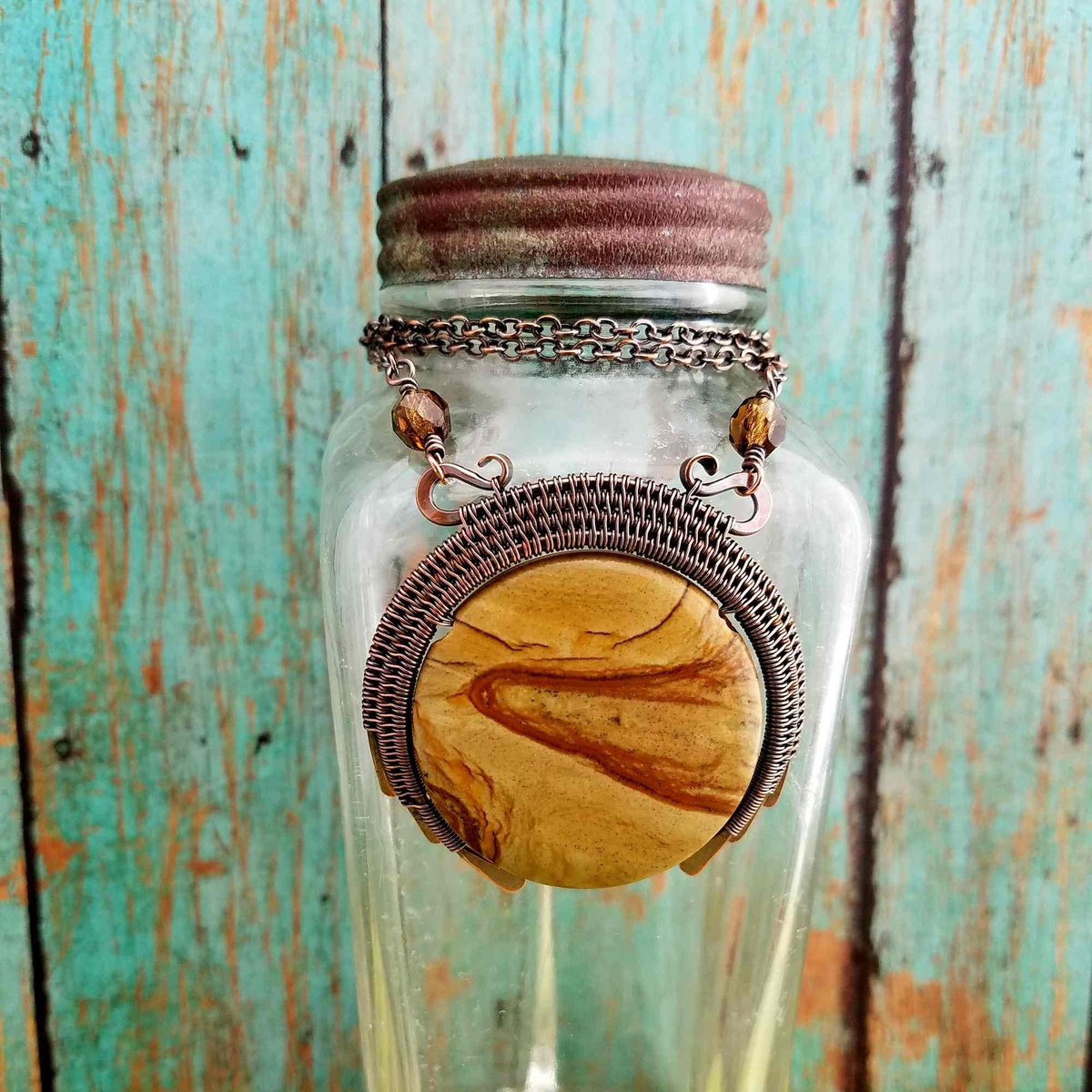 door44studios's tweet photo. The Desert Moon Necklace - Featuring a gorgeous Wood Jasper stone coin in a handwoven copper halo frame suspended on an 18-inch copper chain https://t.co/xSI2i5xb3F #MyNewTag #Door44Studios #Etsy #Door44Original https://t.co/VGxziJjhi6