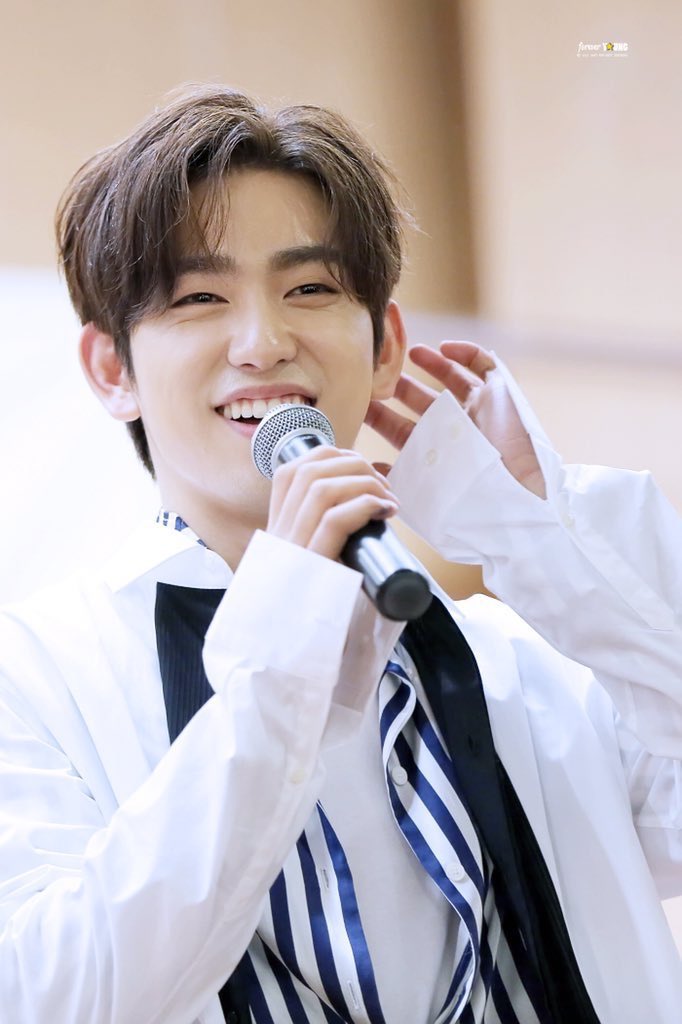 jinyoung touches his ear when he gets shy