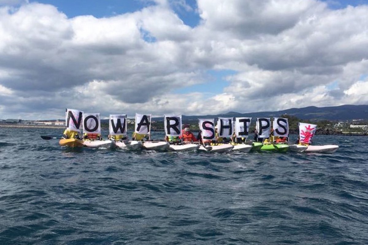 Villagers in kayaks protesting against the visit of the USS Ronald Reagan to Jeju, South Korea, on October 11, 2018. Photo: Association of Gangjeong Villagers Against the Jeju Navy Base https://www.scmp.com/news/asia/east-asia/article/2168417/jeju-jittery-us-warship-visit-reminds-islanders-dark-chapter