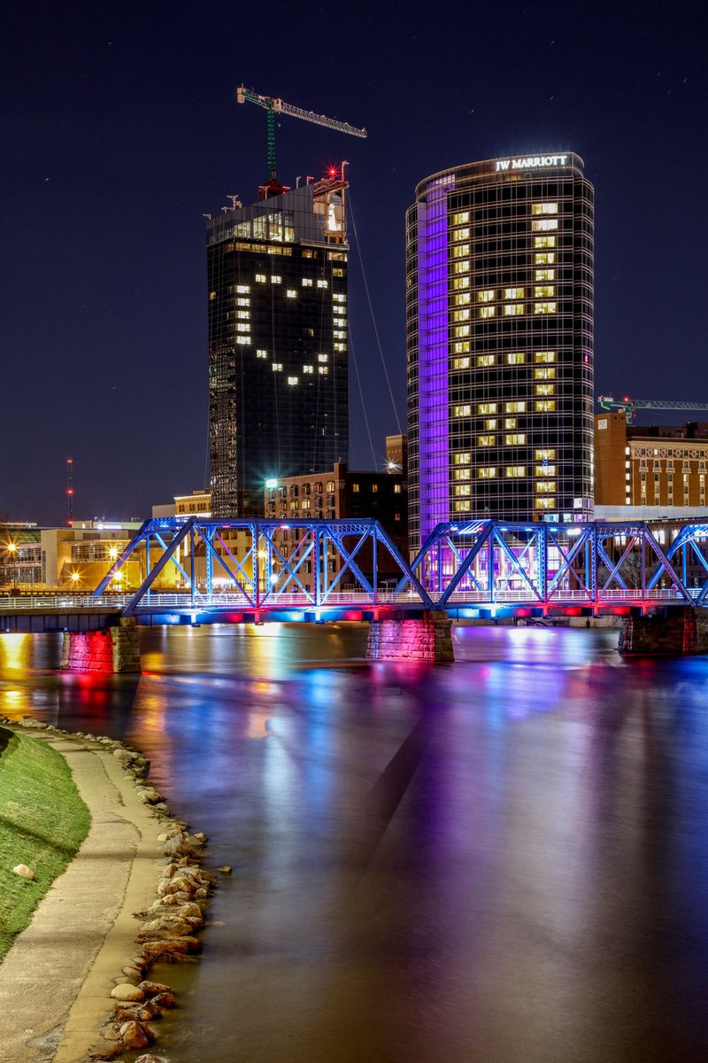 Mbuckstudio's tweet photo. We kept lots of room between us and everyone else as we captured the beautiful lights of downtown Grand Rapids last night.  The JW joined the Amway with a great message of hope and love.   We have a great city!  #USA #CARE #grandrapidsphotography #Architecturephotos #ILOVEGR https://t.co/drGcmv4zpM
