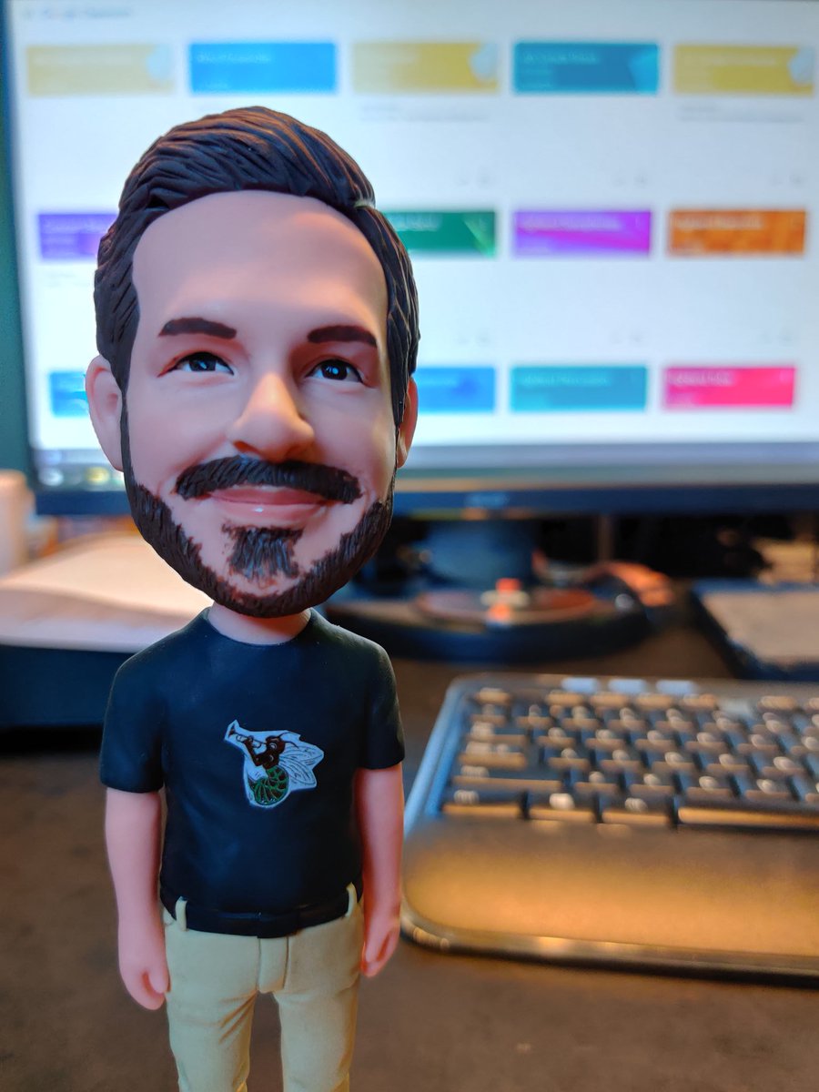 MrRudolphHLS's tweet photo. My Mr. Rudolph bobblehead, given to me by band students from HHS Class of 2018, stands guard over Google Classroom as my students continue to submit fantastic virtual assignments. Good work, everyone! We miss you! #HighlandAtHome #ProtectTheNEST https://t.co/KRuHfDzvRv