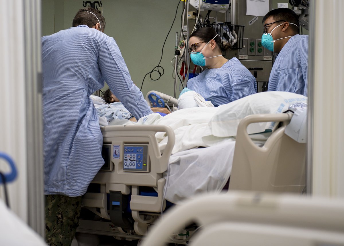 Image date: 04/02/22020 - released 1:18pm today, Apr 3. Sailors treat a patient aboard the hospital ship USNS Mercy (T-AH 19) April 2. Mercy deployed in support of the nation's COVID-19 response efforts, and will serve as a referral hospital for NON - COVID-19 patients
