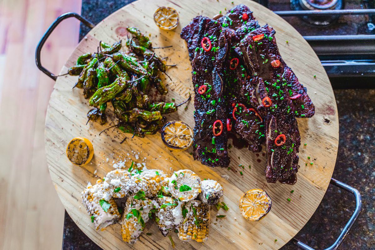 HostGregHutson's tweet photo. Some screen shots from Greg Hamilton’s #WWEats !! Video dropping next week. Sous vide and grilled Asian short ribs, grilled corn with chipotle-lime crema and blistered shishito peppers with Korean Gochugaru chile flakes. 
📸: @palmphotoz https://t.co/nZtzsyS4Hy