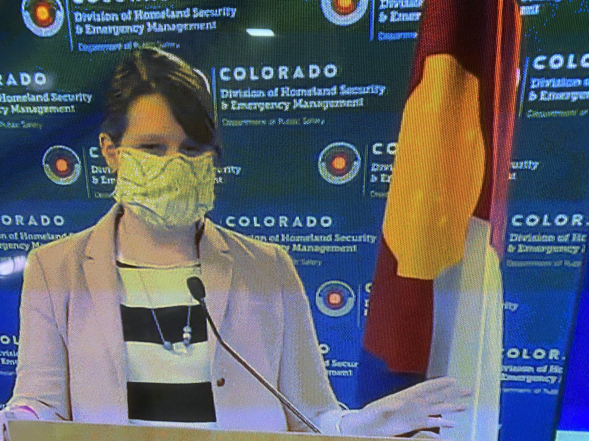 People speaking at an official press conference behind masks has a distinct Watchmen vibe.