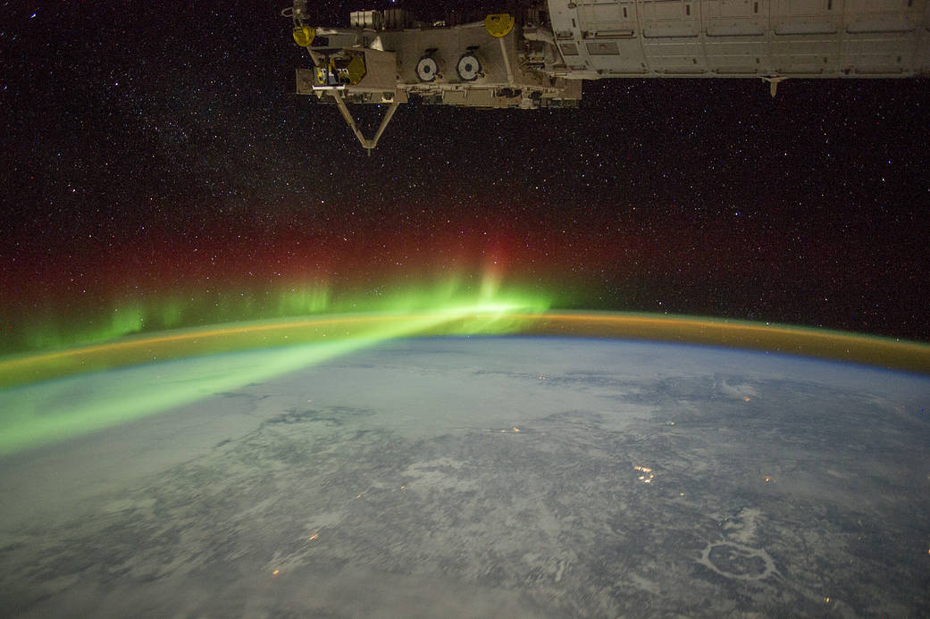 Astronauts on board the International Space Station get to view auroras from a unique vantage point. This photo of the northern lights (aurora borealis) above Canada was taken by an ISS astronaut in 2012:  https://s.si.edu/3bPXnu1 