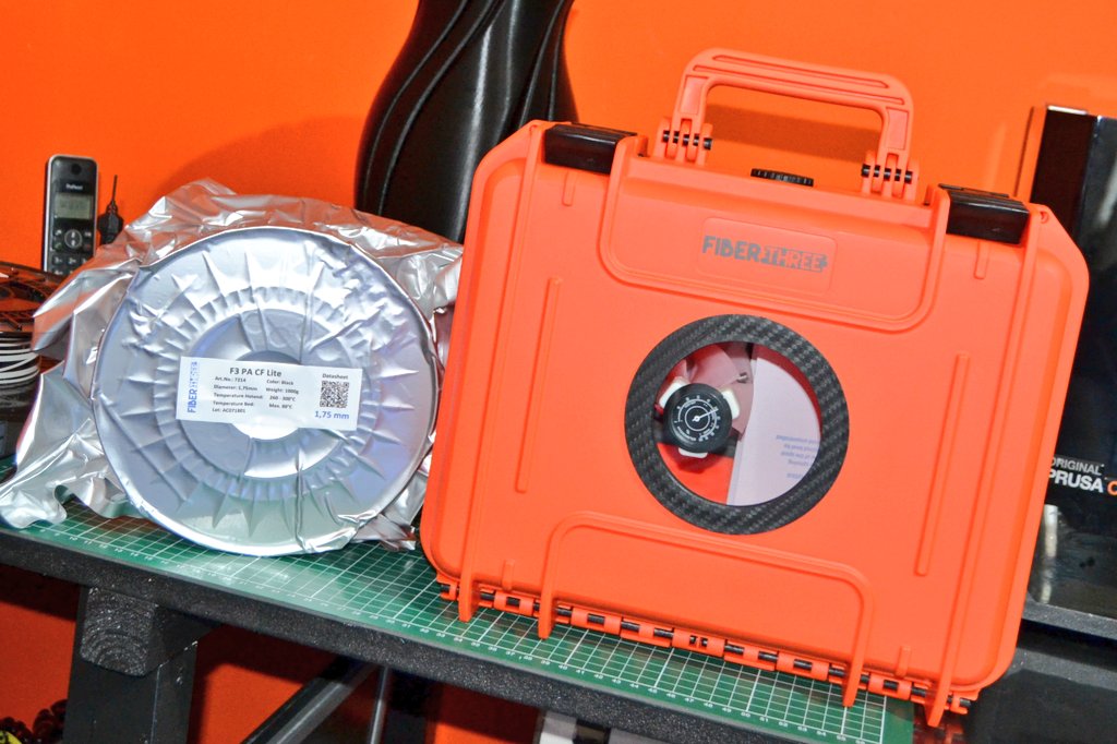 de3dprintman's tweet photo. Now #3Dprinting another set extruder parts for the Original #Prusai3MK3S using #FiberThree #PA_CFLite in their drybox on the Original #PrusaMINI by @josefprusa. This #CarbonFilled material stays nice and dry in this FiberThree drybox and is easy to transport between #3Dprinters. https://t.co/HkjuzWFOW3