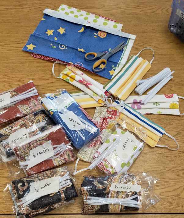 UrsulineNR's tweet photo. Ms DiIoro and Ms McDermott are busy creating masks to give to those who are working on the frontline during this battle against COVID-19.   #MaskaHero #UrsulinePride https://t.co/jCVkBRgIkM