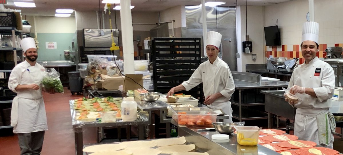 HospitalityUofG's tweet photo. THANK YOU to our #team in the University Centre kitchen. 

They prepared 350 lunches for essential workers on campus today.

Keep up the great work everyone! ❤️🖤🧡

#UofGChefs #UofGCampusFood #GryphonPride #Guelph #UofG https://t.co/uRKzgiT2J0