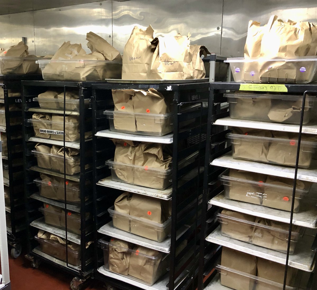 HospitalityUofG's tweet photo. THANK YOU to our #team in the University Centre kitchen. 

They prepared 350 lunches for essential workers on campus today.

Keep up the great work everyone! ❤️🖤🧡

#UofGChefs #UofGCampusFood #GryphonPride #Guelph #UofG https://t.co/uRKzgiT2J0