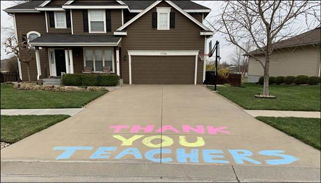 I'm so proud of Kansas teachers, administrators, students and families as we transitioned to Continuous Learning this week. This photo, taken a few days ago, in a Kansas neighborhood says it all. Thank you.