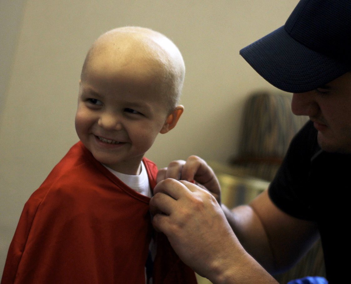 ToddTurfe's tweet photo. Everyone meet Lucas, he is my hero. Here is a kid who didn’t care if I was Batman or Todd Turfe, and a kid who had just been through chemotherapy... but still managed to smile and make me feel like I was the best person in the world. https://t.co/v7fKGSCqNN