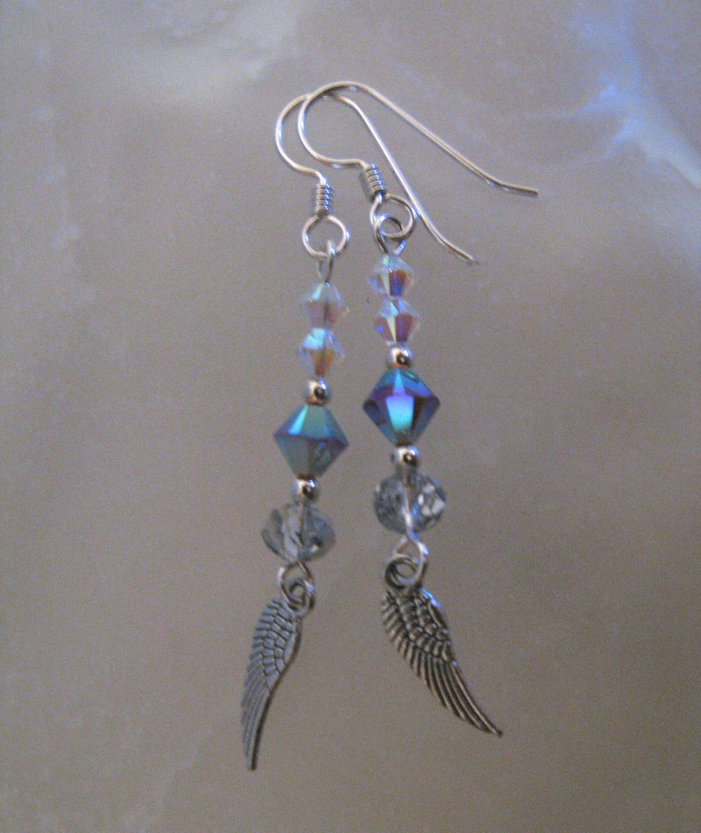 "Evil Winter Angel: She Looks So Peaceful" earrings: