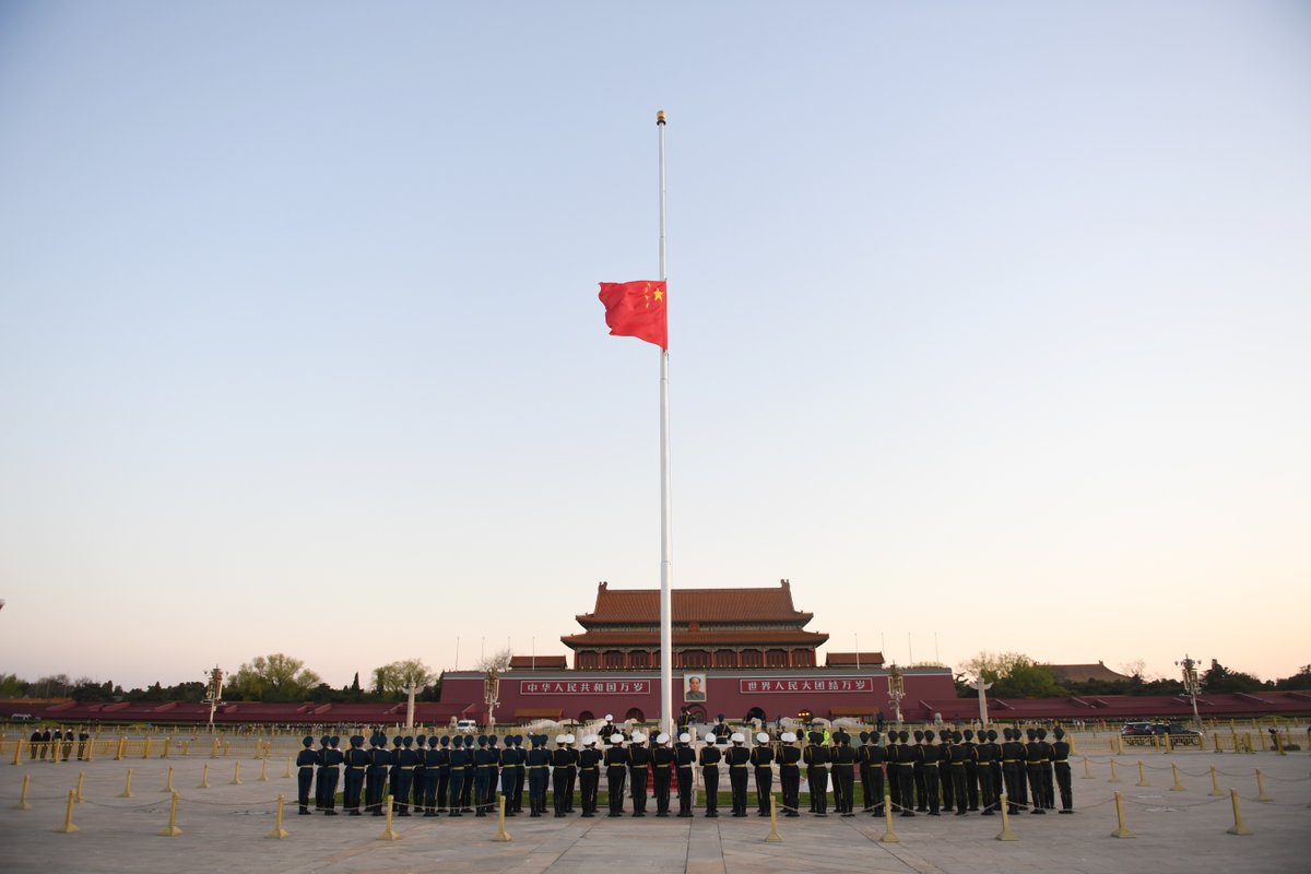XHNews's tweet photo. Chinese national flag flies at half-mast to mourn for martyrs who died in the fight against #COVID-19 outbreak and compatriots died of the disease at Tian'anmen Square in Beijing https://t.co/8hFml46n8q https://t.co/o2dOqlt0l7