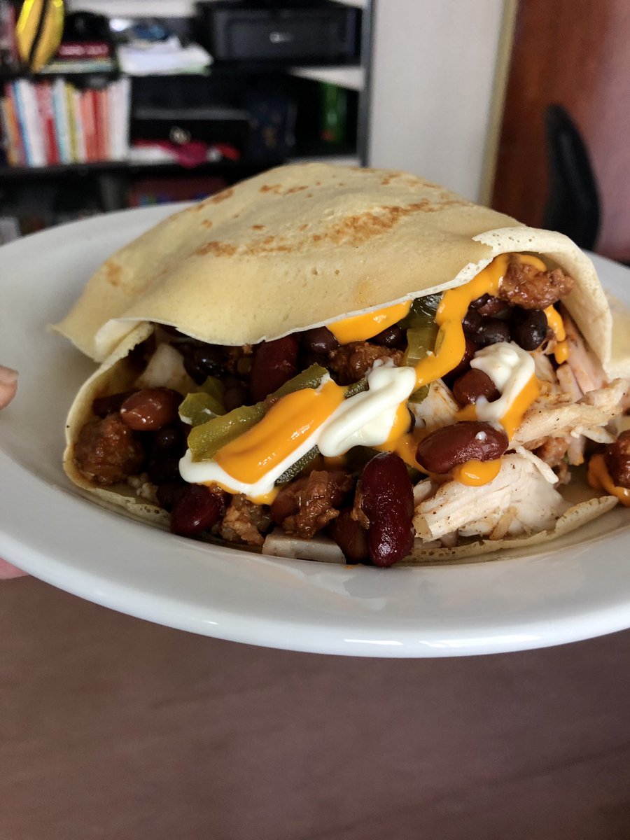  #burritoday Burrito Chacarero in the style of the Super Rueda in Miraflores, Lima, Perú  Ingredients: chicken, turkey, pork, chorizo, black beans, guacamole, sweet pickled turnip in thin slices (chifa style), mayonnaise, other sauces depending on personal taste. 1/n