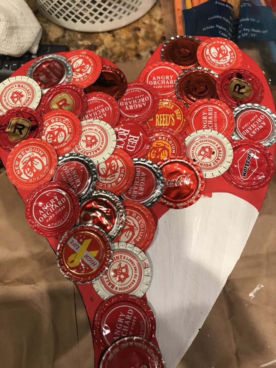Pounding bottle caps.