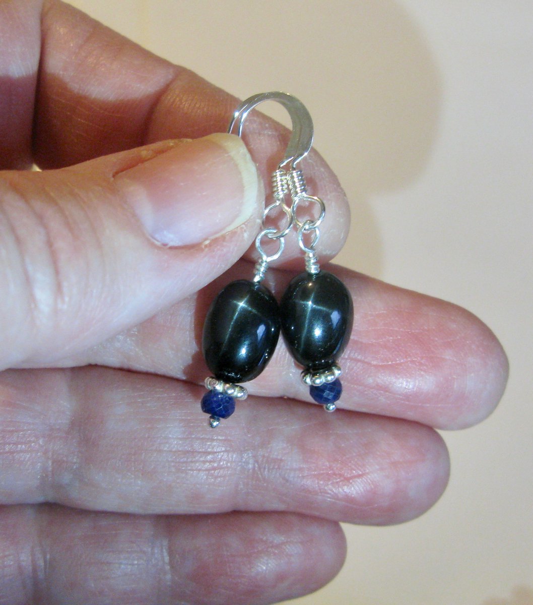 Another space-themed piece is "Black Star Shining." I had some black star diopside beads from a while back, and then I found some tiny sapphire beads, and that's what led to these earrings. Gotta love the optical phenomenon of asterism there. Tricks of the light are beautiful.