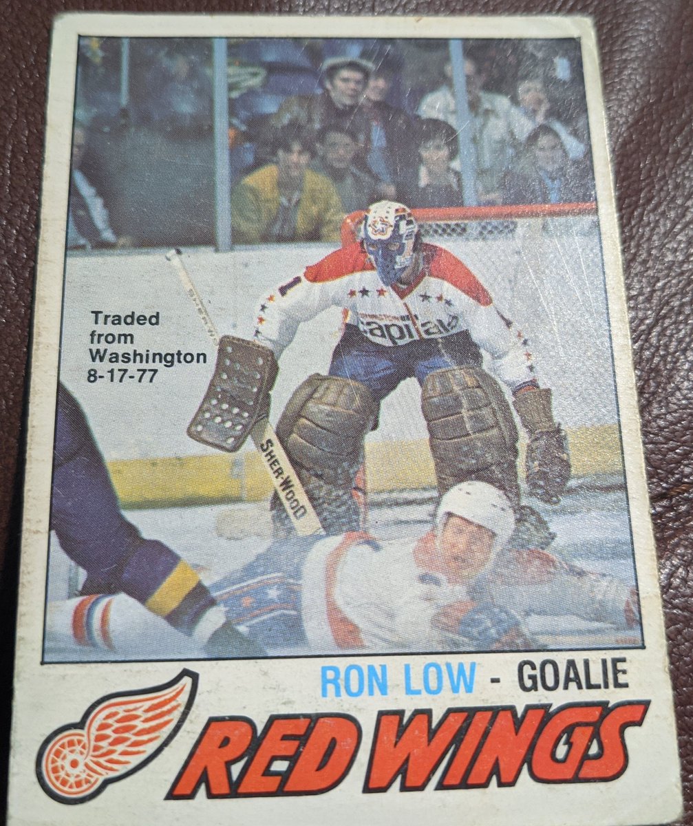 Long before he became a saviour (in more ways than one) for the Oilers, Ron Low was a Redwing after a trade from Washington. At the printing of this card he was the Caps leader in GP, minutes played, and wins with back 2 back 5.45GAA seasons.