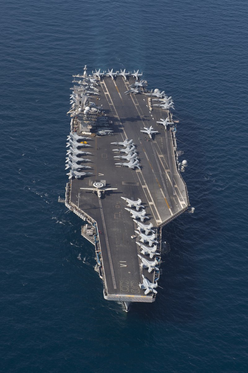 A nice picture of the aircraft carrier USS Dwight D. Eisenhower  @TheCVN69 transiting through the Arabian sea on April 2, 2020. A Hawkeye and a couple of Super Hornets are getting ready to launch. #USNavy  by MCS Seaman Brennen Easter.