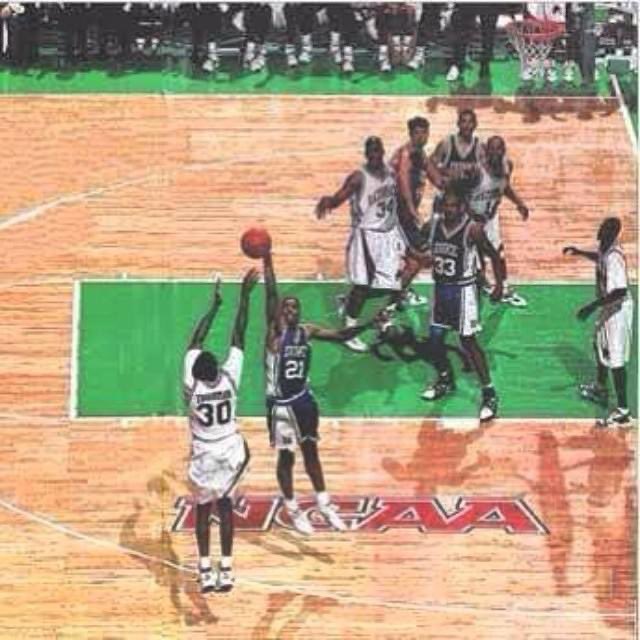 KEL0818's tweet photo. I was a student at @UArkansas 26 years ago when this shot was made. 

What a fun time to be a student and on Dickson street.  #40minutesofhell #Rustonrifle #nationalchamps ❤️🐗.   @RustonRifle @RazorbackMBB @CoachCorliss @CoreyBeck14 https://t.co/Oov7ZJ0N0r