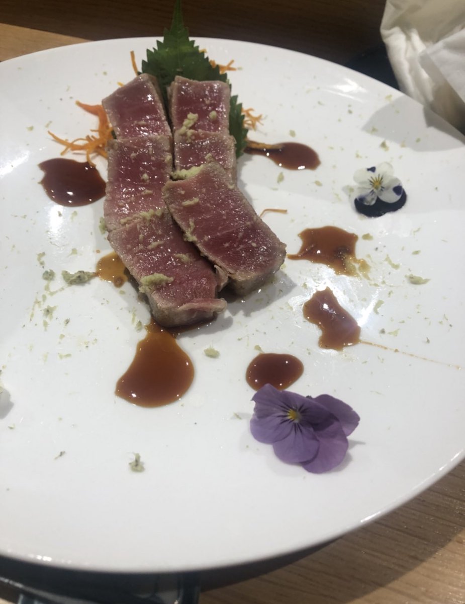 Seared fatty tuna with truffle butter and wasabi, razor clam ceviche with whisky jelly at Sushi Atelier