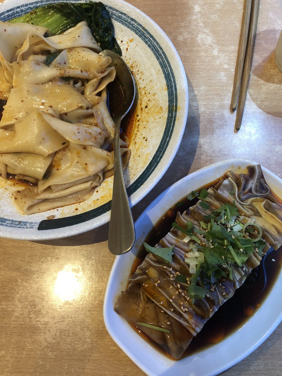 Hand pulled noodles and pigs ears in soy and chilli at Xian Impression