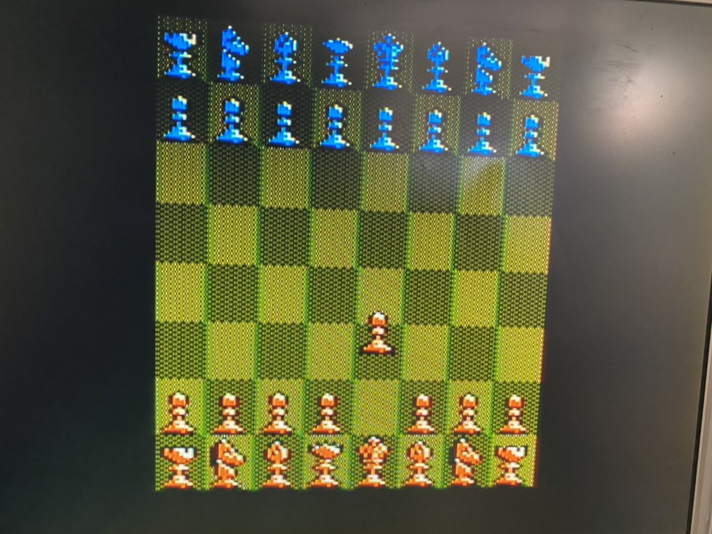 Who’s in the mood for some wagering? I set up my Atari 2600 and Apple II to play each other in chess. Apple is white on the Atari screen, orange on the Apple screen. I’ll post updates as the game progresses. Place your bets! I tried to even the odds, too (see replies)